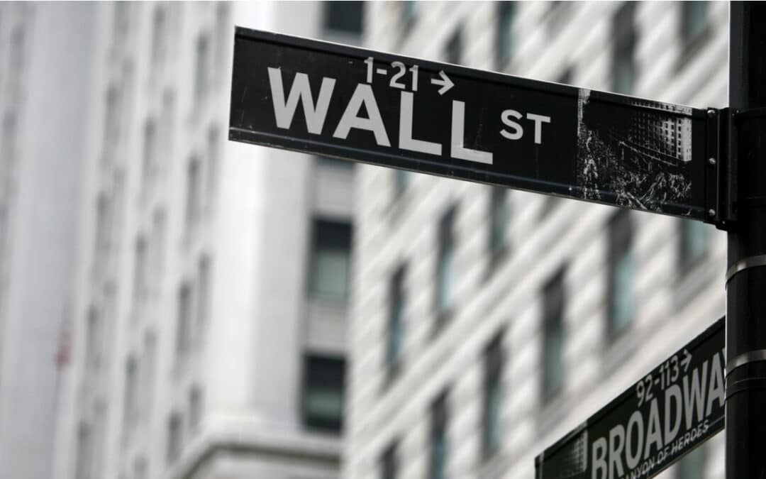 wall street and broadway corner signs